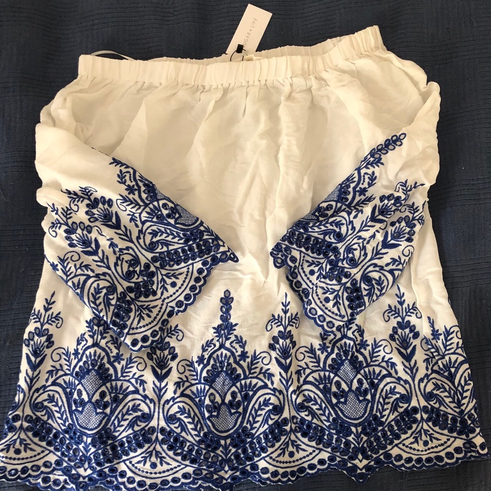 Sugar lips off the shoulder white and blue shirt
